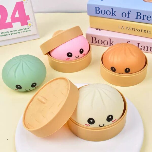 Cartoon realistic squeeze toy with expressive buns, stress-relief gadget, small steamed bun fake food prank toy
